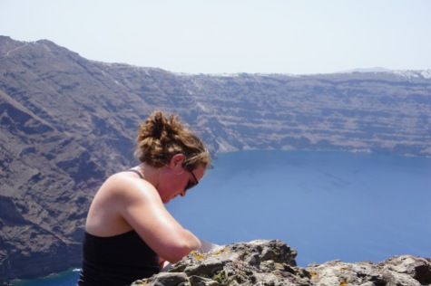 Leah looking at a basalt dike (view to the south over the caldera)